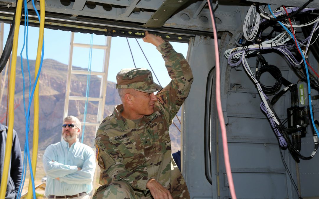 Brig. Gen. Robert Collins hand over the reins of Program Executive Office