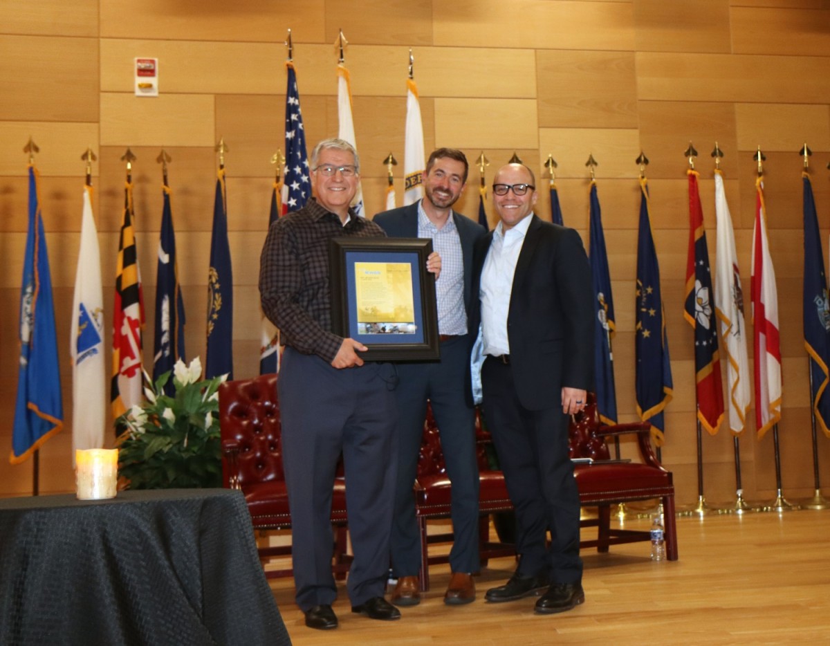  Mr. Nelson Blitz from the Jewish Community Relation’s Council’s Holocaust Speakers Bureau (left) receives a plaque of appreciation from Mark Kitz, head of the Program Executive Office Intelligence, Electronic Warfare and Sensors (PEO IEW&S) and Michael Schwartz, System of System Engineering Division Chief. Blitz shared a poignant and personal account of his family's experiences during the Holocaust at a Day of Remembrance event hosted by PEO IEW&S at Aberdeen Proving Ground, Maryland. (U.S. Army photo by Brian Cooper)