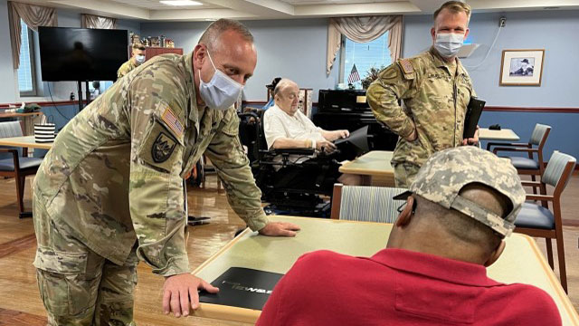 Brig. Gen. Ed Barker, Program Executive Officer, Intelligence, Electronic Warfare and Sensors (PEO IEW&S) along with other Soldiers greeted veterans at the Perry Point VA facility. They distributed certificates of appreciation and spent time talking to them about their Army experiences. (Photo Credit: Allison Weissert)