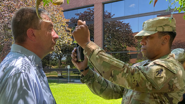 A Soldier performs an iris collection using a Next Generation Biometric Collection Capability (NXGBCC) mobile biometrics collection device at Fort Leonard Wood. (Photo Credit: Esther VanCleave)