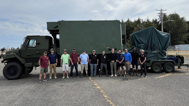 Members of Project Manager Intelligence Systems and Analytics transported the first Tactical Intelligence Targeting Access Node (TITAN) prototype to Joint Base Lewis-McChord. (Photo Credit: US Army)