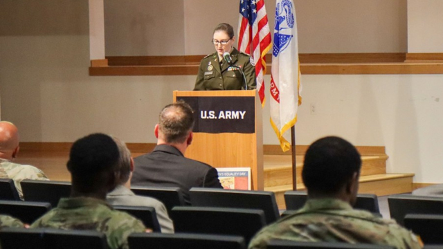 Lt. Col. Julia Ryan, deputy commander for nursing at Kirk U.S. Army Health Clinic, speaks about her experience in the Air Force Junior Reserve Officer Training Corps at her high school. Ryan served as the keynote speaker at Aberdeen Proving Ground’s annual Women’s Equality Day observance at the Mallette Training Facility Aug. 19, 2024. (Photo Credit: Sierra Merrill, PEO IEW&S)