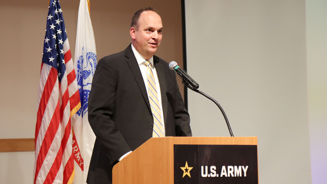 Nicholaus Saacks, deputy program executive officer for intelligence, electronic warfare and sensors, thanks members of the audience for attending the annual Women’s Equality Day observance at the Mallette Training Facility on Aberdeen Proving Ground Aug. 19, 2024. Saacks gave opening remarks for the event. (Photo Credit: Sierra Merrill, PEO IEW&S)