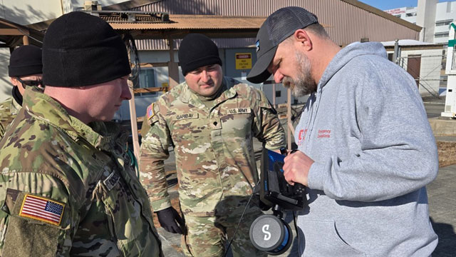 Instrument Set, Reconnaissance and Surveying (ENFIRE) Technical Lead Jeremy Wasson instructs Soldiers on handheld 3D light detection and ranging (LIDAR) use. (Photo Credit: Fred Knudsen)