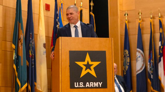 Chris Jais, incoming PM PNT project manager, provides remarks during a change of charter ceremony on Aberdeen Proving Ground. (Photo Credit: PEO IEW&S)